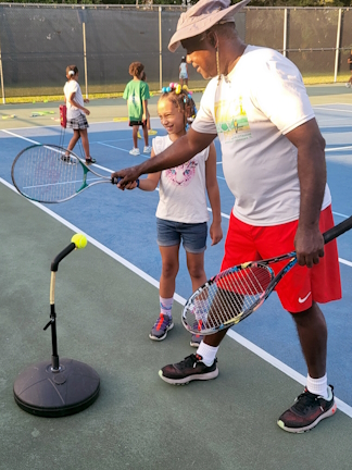 Young tennis players at the C.T. Brown Tennis Center