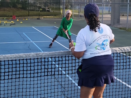 Youth tennis players participating in the Duval Youth Tennis Program