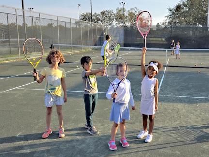 Children participating in the YTF-sponsored St. Pete Tennis Center youth tennis event